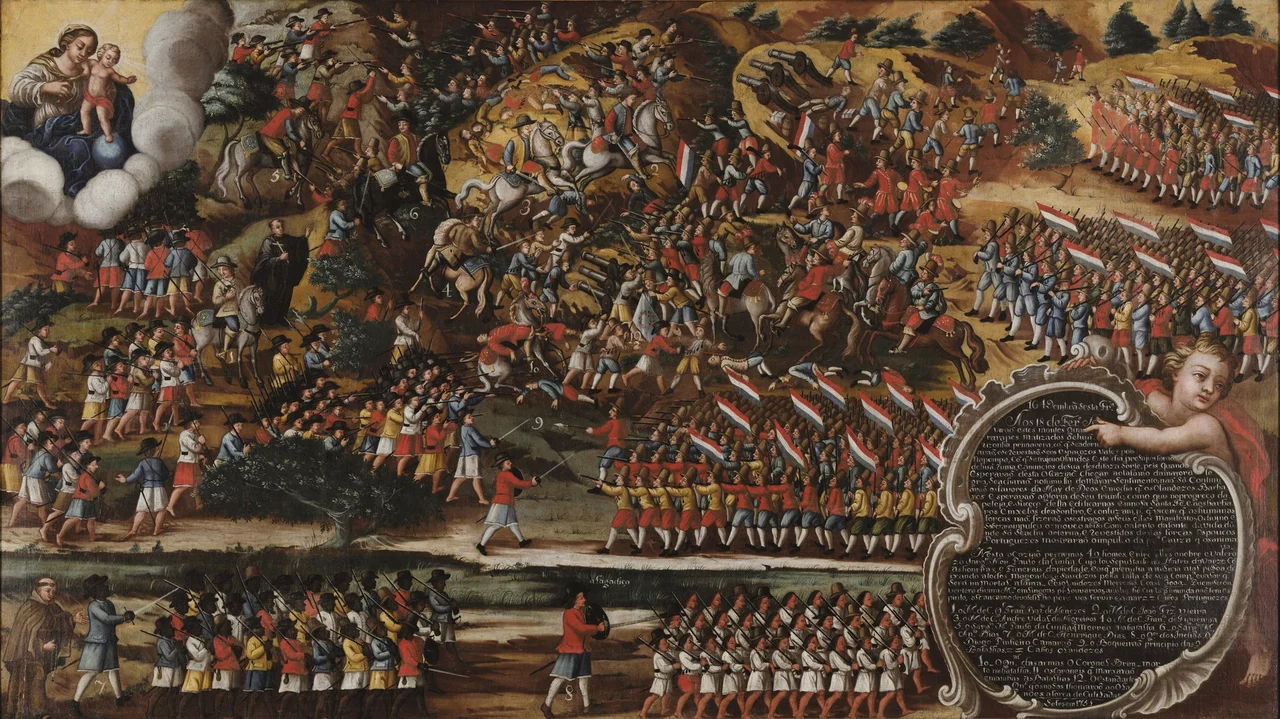 Religious painting depicting the scene of the Battle of Guararapes. In the foreground, in the lower right corner, a little angel supporting a baroque frame with his right hand and pointing to the inscriptions, in white paint with a dark background, with his left hand. In the upper left corner, image of Our Lady with Baby Jesus observing the battle.
The Battle of Guararapes was fought in two clashes between the Dutch army and the defenders of the Portuguese Empire at Morro dos Guararapes, current municipality of Jaboatão dos Guararapes, located in the Metropolitan Region of Recife, in Pernambuco, Brazil. The first confrontation was on April 18 and 19, 1648, and the second and decisive one was on February 19, 1649. It marked the end of the Dutch presence in Brazil, in the 17th century.