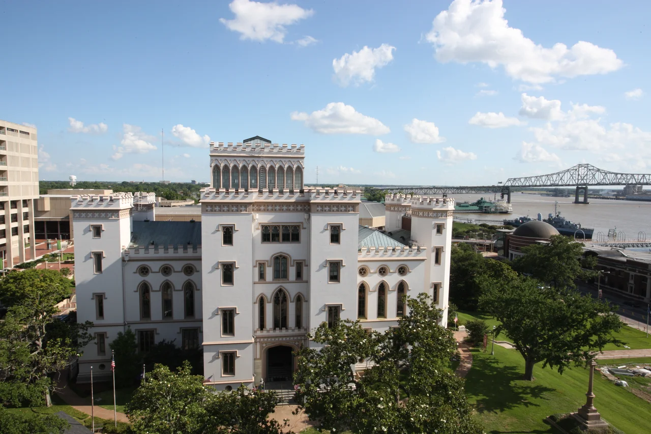 Scope and content: The original finding aid described this photograph as:
Original Caption: The Old Louisiana State Capitol, known as a Gothic architectural treasure, stands surrounded by green trees and grass as the Mississippi River flows in the distance. The four-story white building was built to look and function like a castle.
Location: Location: Louisiana
Status: Public domain. Patrick Salisbury