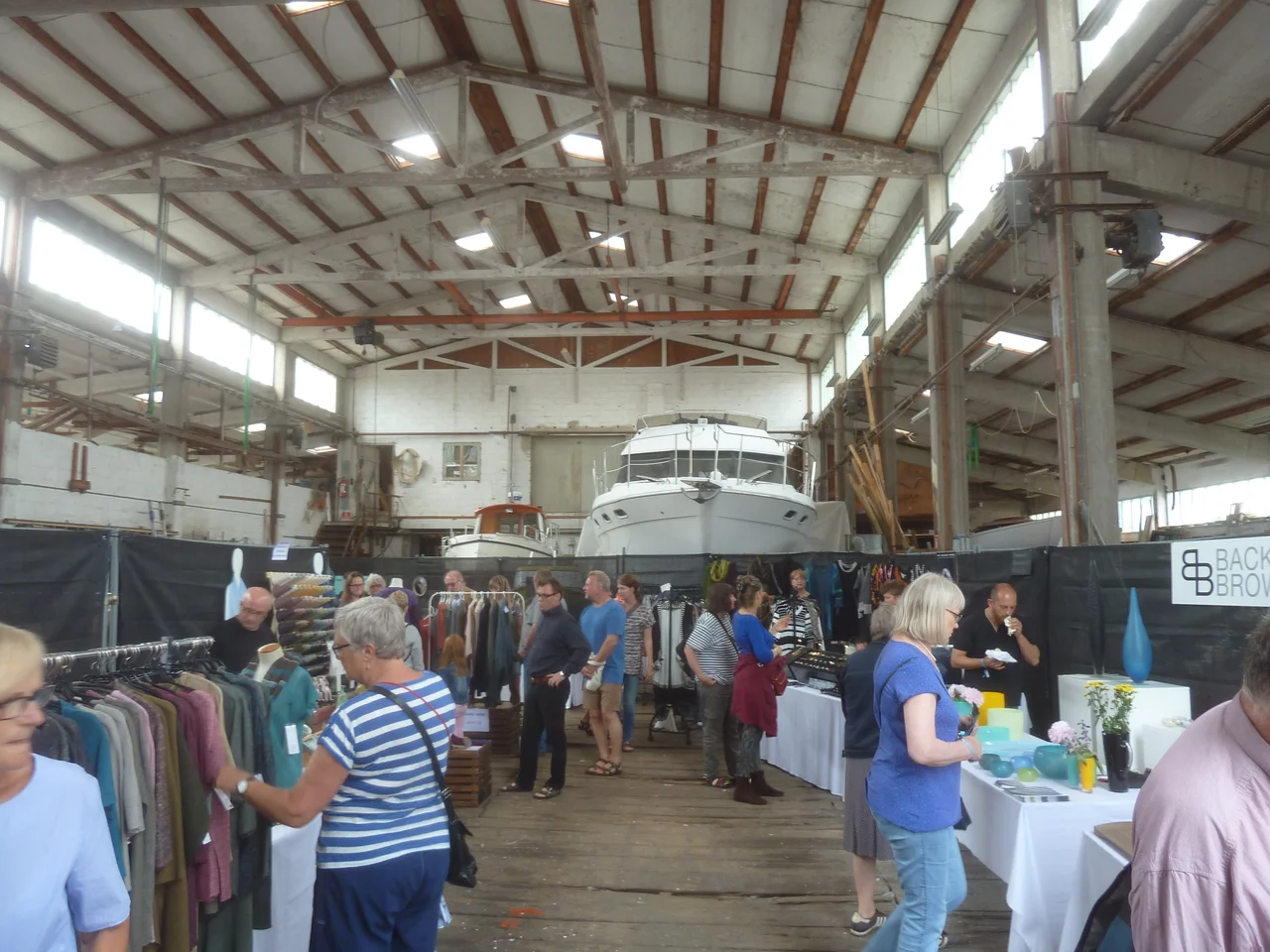 Indoor crafts market in a Building on the Harbour in Hundesgted, Denmark